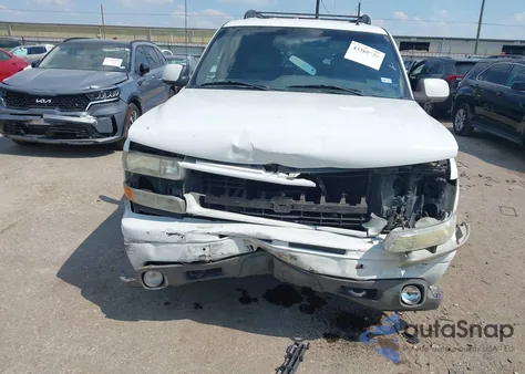 2002 Chevrolet Tahoe Z71 из США, поврежденный, VIN 1GNEK13Z12R121237
